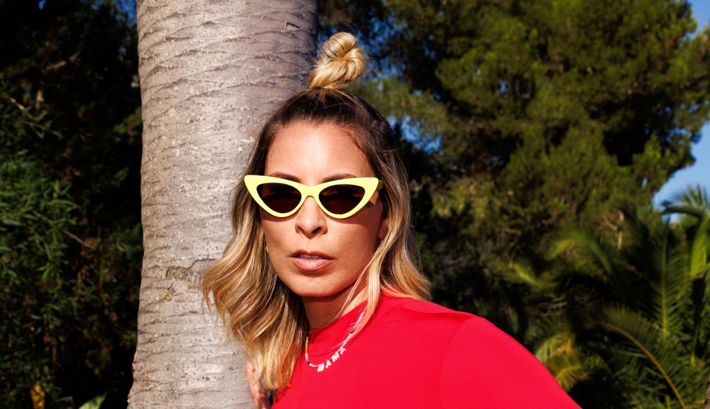 BLOND:ISH photographed outdoors in sunglasses